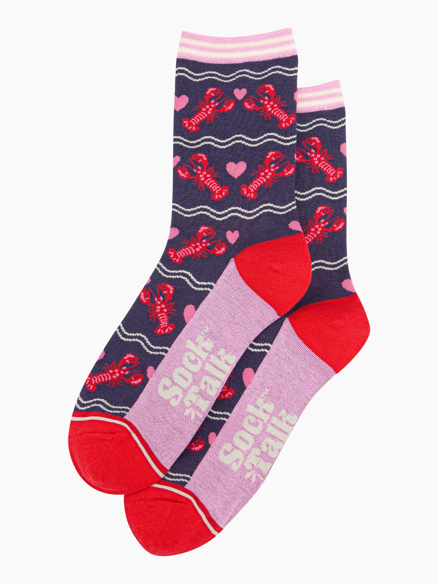 the pair of lobster and love heart socks laying flat, one on top of the other. showing clearly the all over pattern of red lobsters, white wavy lines and pink love hearts.