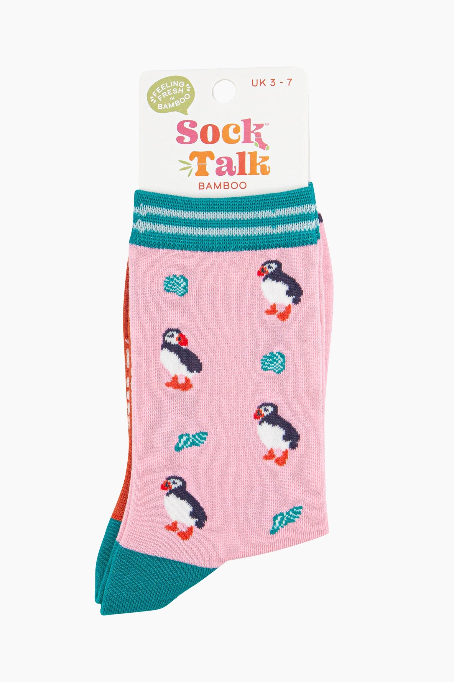 women's pink puffin and seashell ankle socks in their sock talk packaging, the socks are a uk size 3-7.