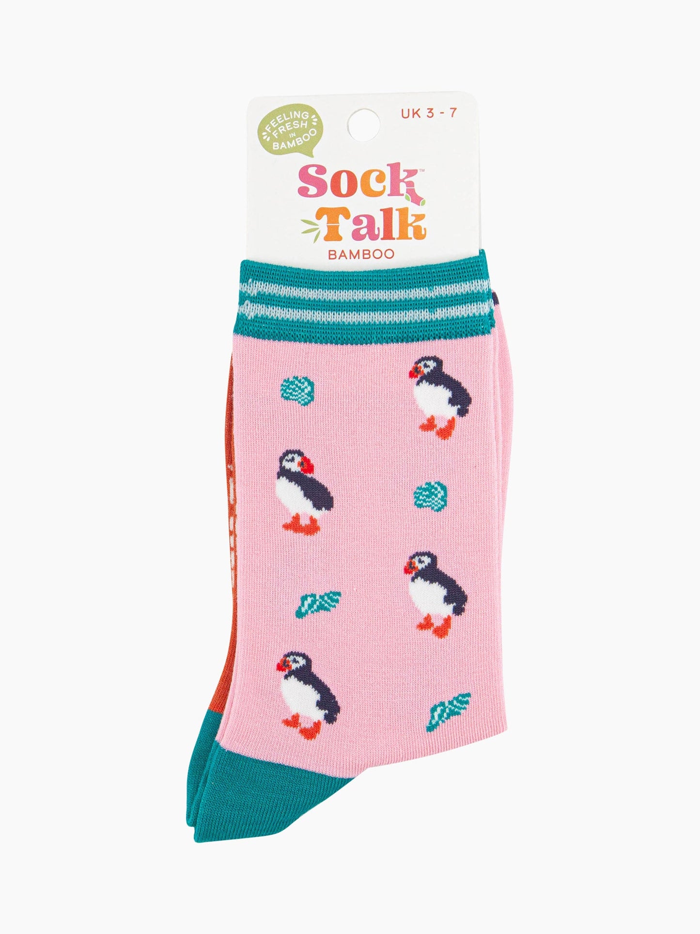 women's pink puffin and seashell ankle socks in their sock talk packaging, the socks are a uk size 3-7.