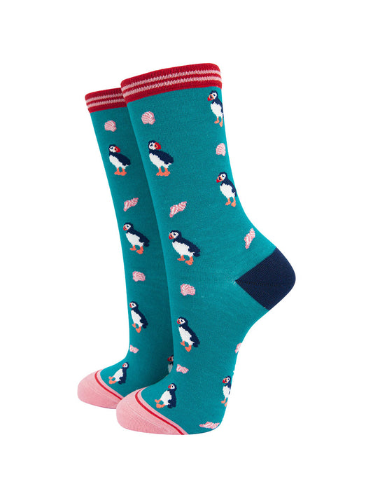 turquoise bamboo socks with an all over puffin bird and seashell pattern