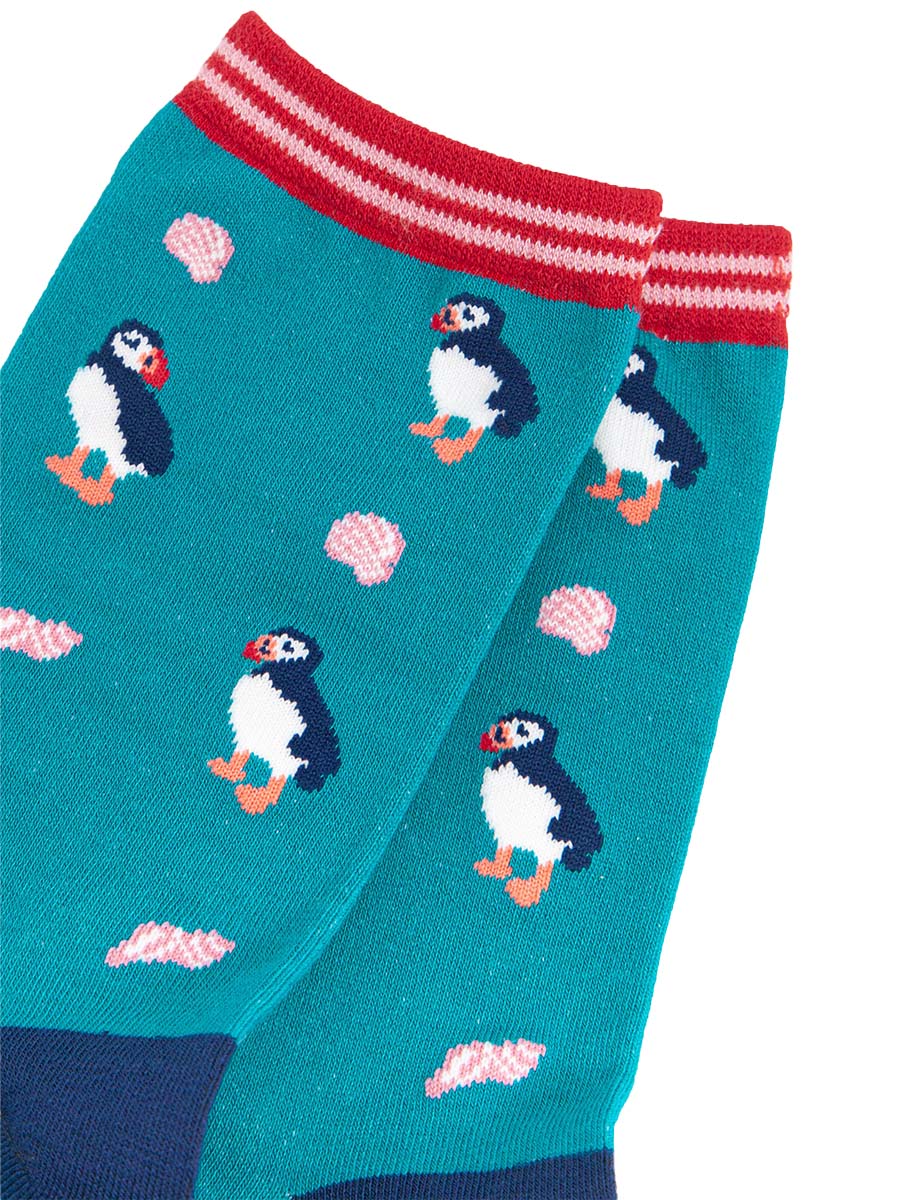 close up of the puffin pattern and of the striped cuff on the bamboo ankle socks
