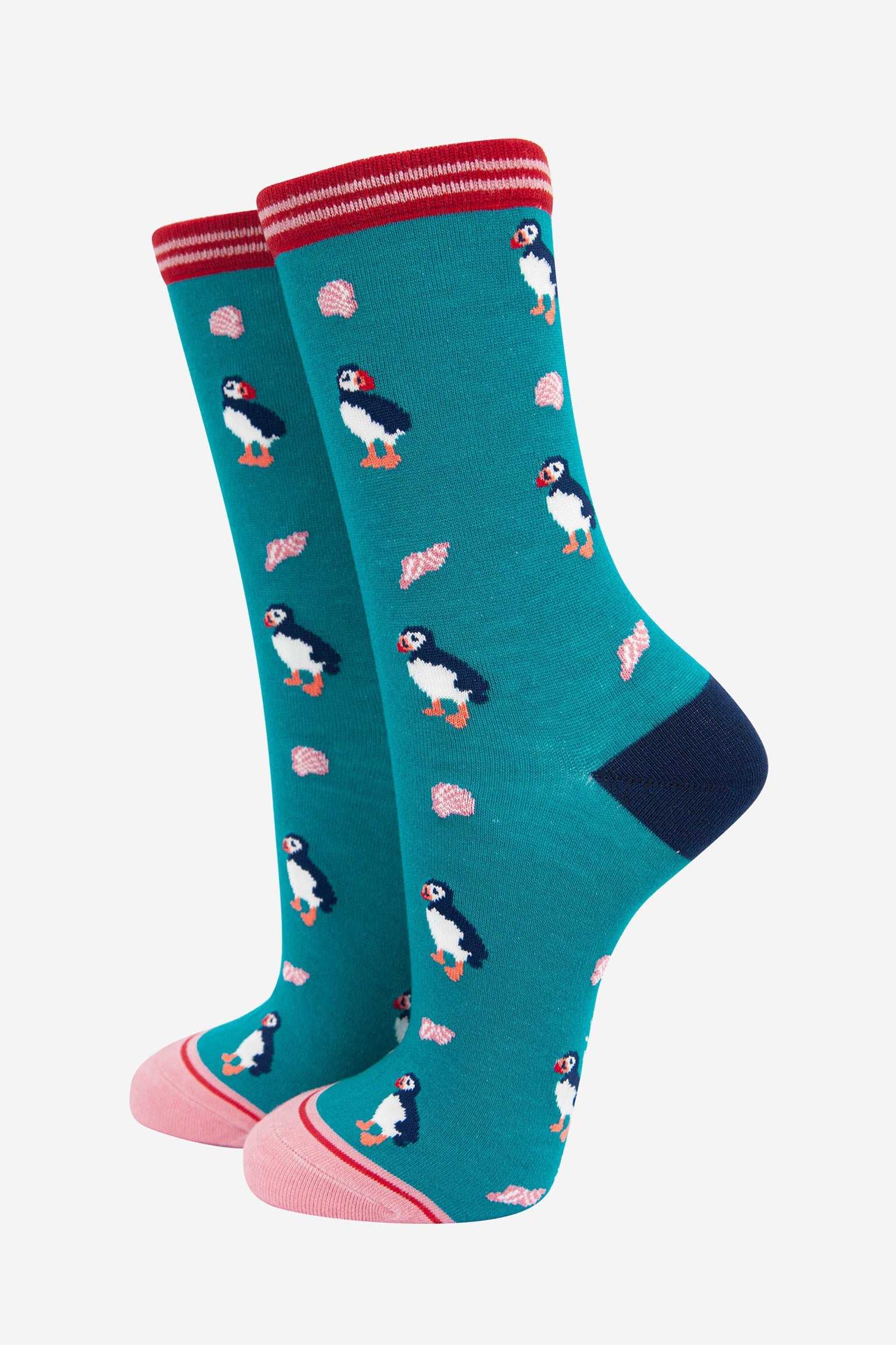 turquoise bamboo socks with an all over puffin bird and seashell pattern