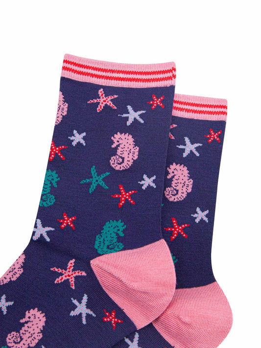 close up of the seahorse and star fish print pattern