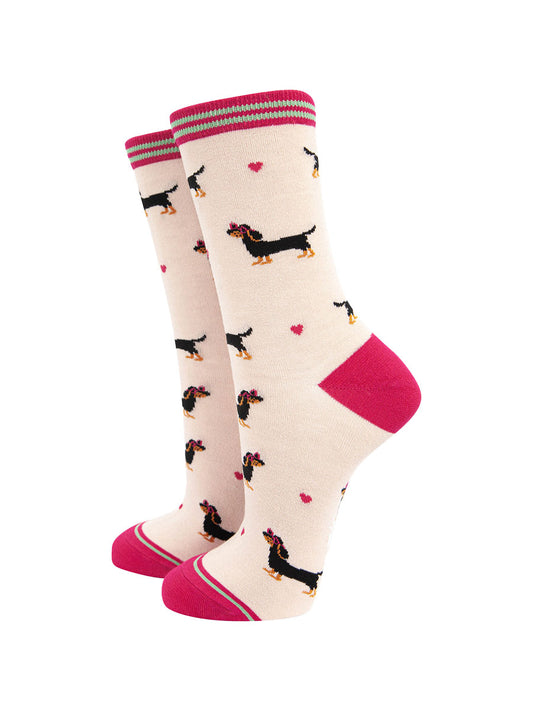 cream and pink bamboo ankle socks featuring a black miniature dachshund wearing pink love heart glasses