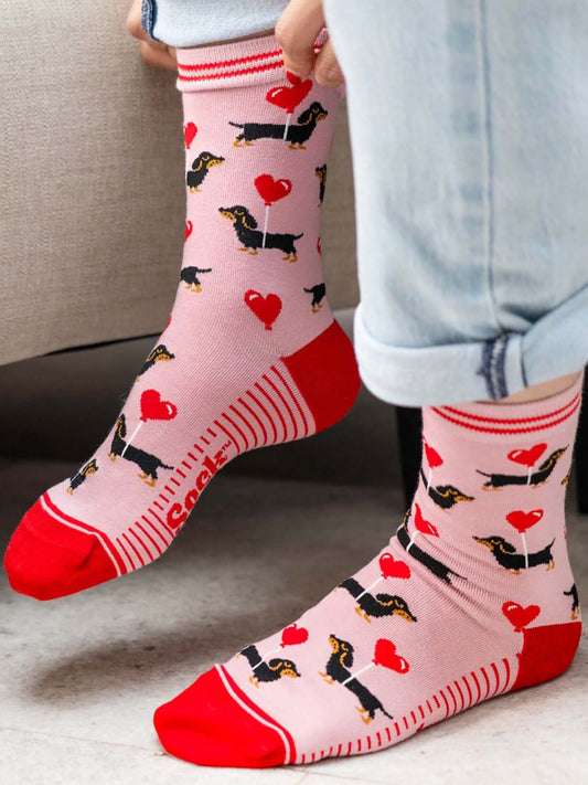 sausage-dog-print-bamboo-socks-in-pink-and-red