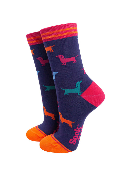 navy blue and pink bamboo ankle socks featuring multicoloured sausage dogs and a striped cuff