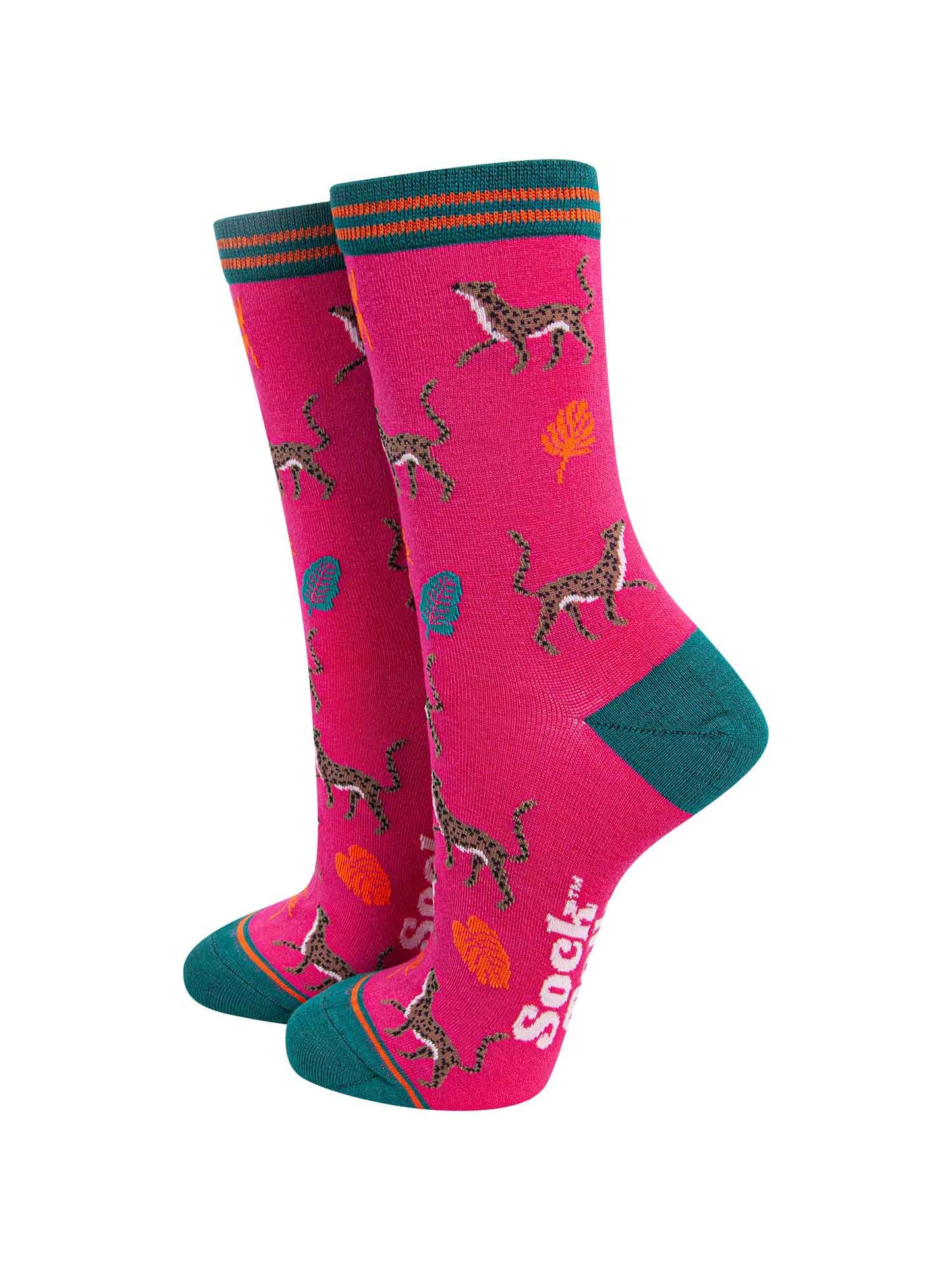 fuchsia pink bamboo socks with a green heel, toe and cuff featuring an pattern of cheetah cats and colourful jungle leaves