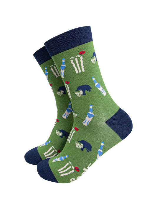green and navy blue bamboo socks featuring a pattern of cricket stumps and bats