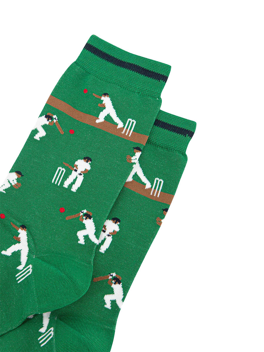mens-bamboo-socks-green-cricket-players-close-up-cricketers-hitting-red-ball-white-wickets-running