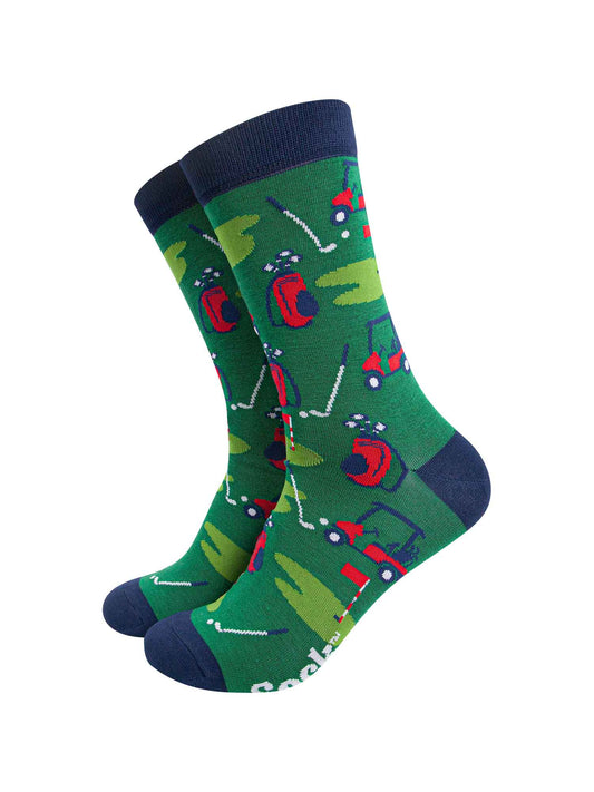 green bamboo golf socks featuring a putting green , golf carf and golf bag scene