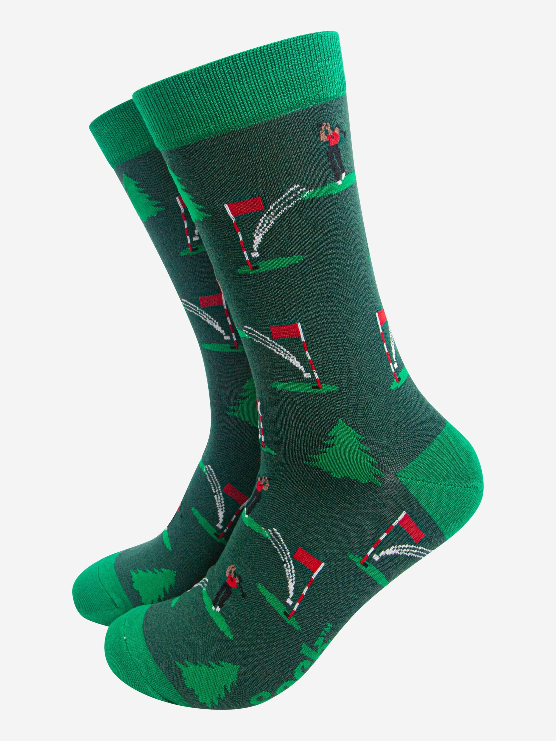 green bamboo socks featuring a golf scene with a golfer on the green