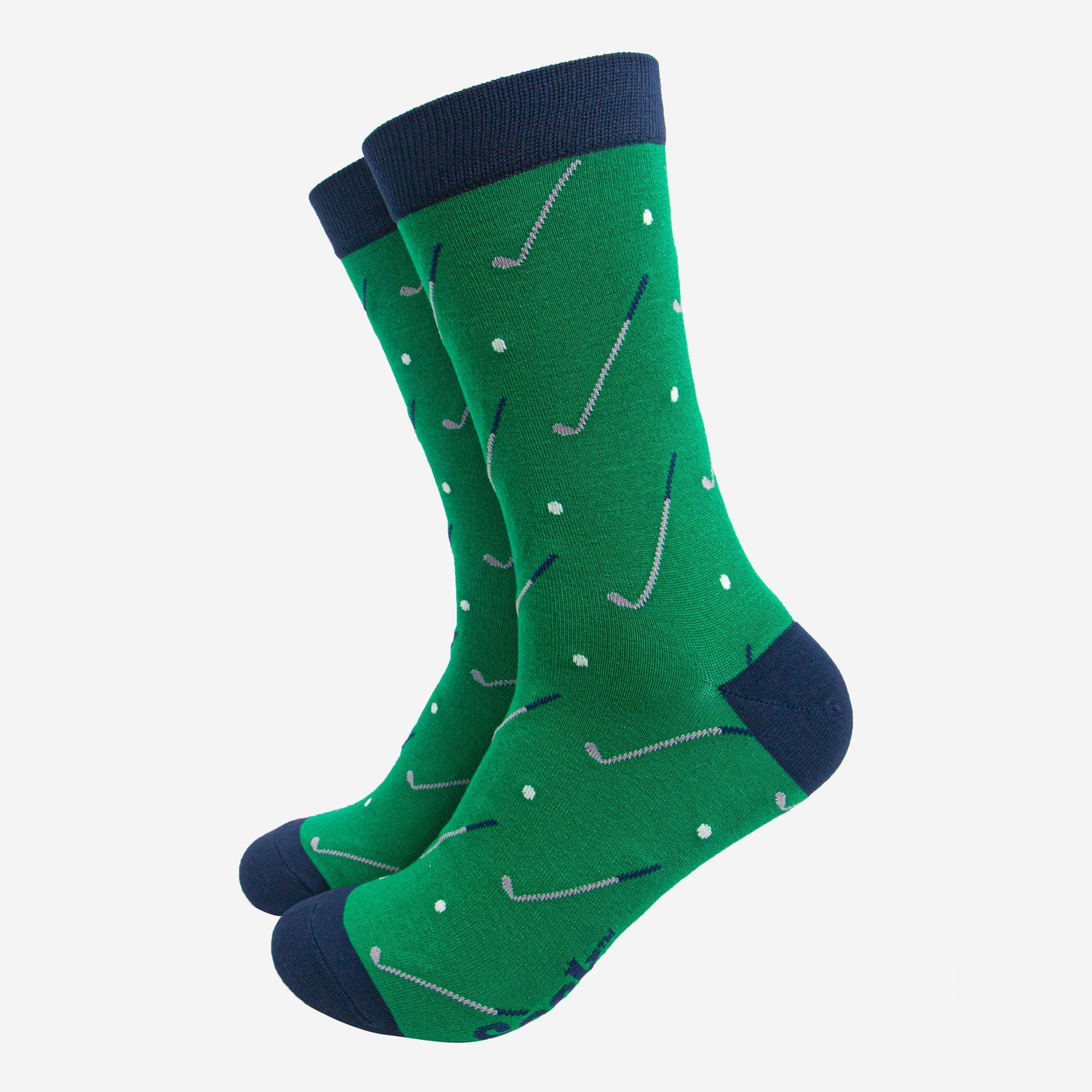 green dress socks with an all over pattern of golf balls and golf clubs