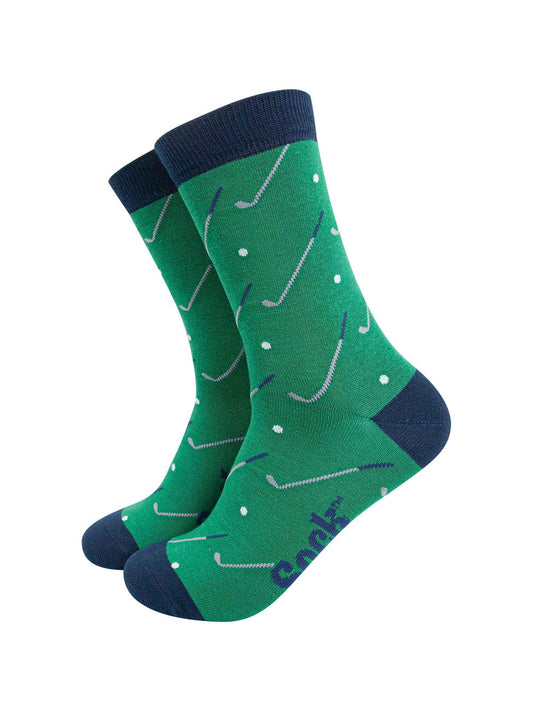 green dress socks with an all over pattern of golf balls and golf clubs