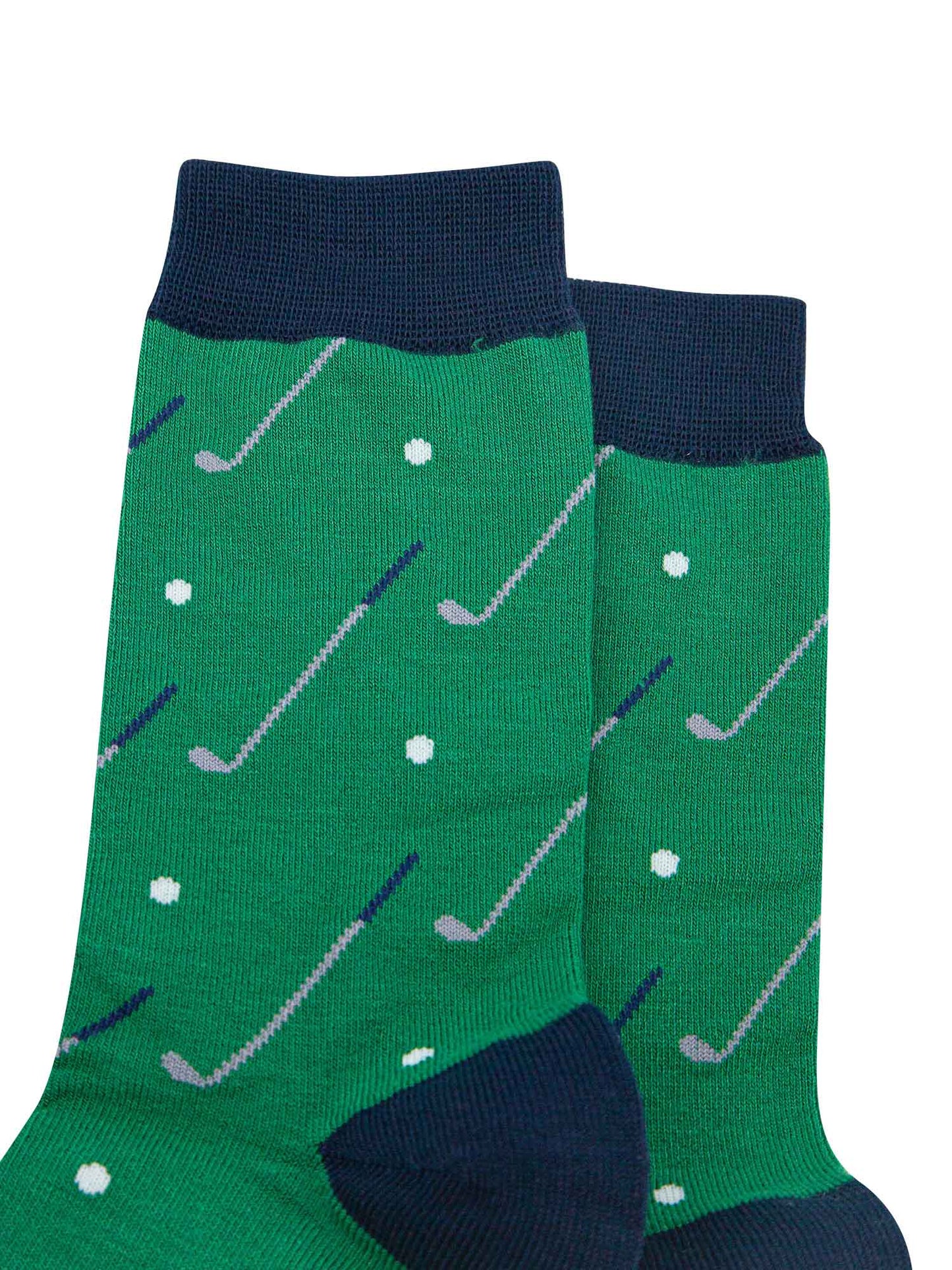 close up of the golf ball and golf club design on the socks