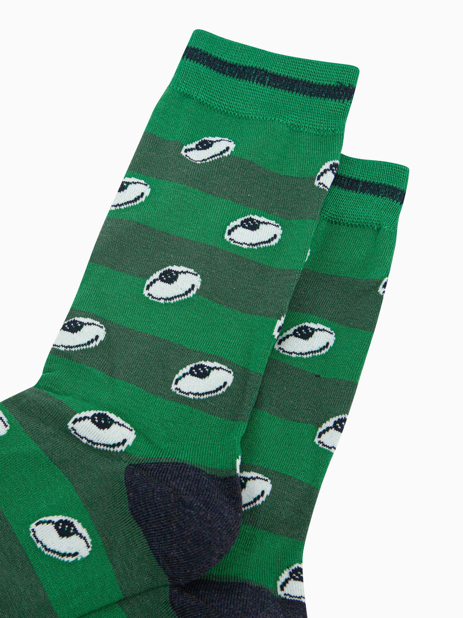 mens-bamboo-socks-green-rugby-ball-stripe-close-up-white-oval-sports-balls-green-striped-pitch