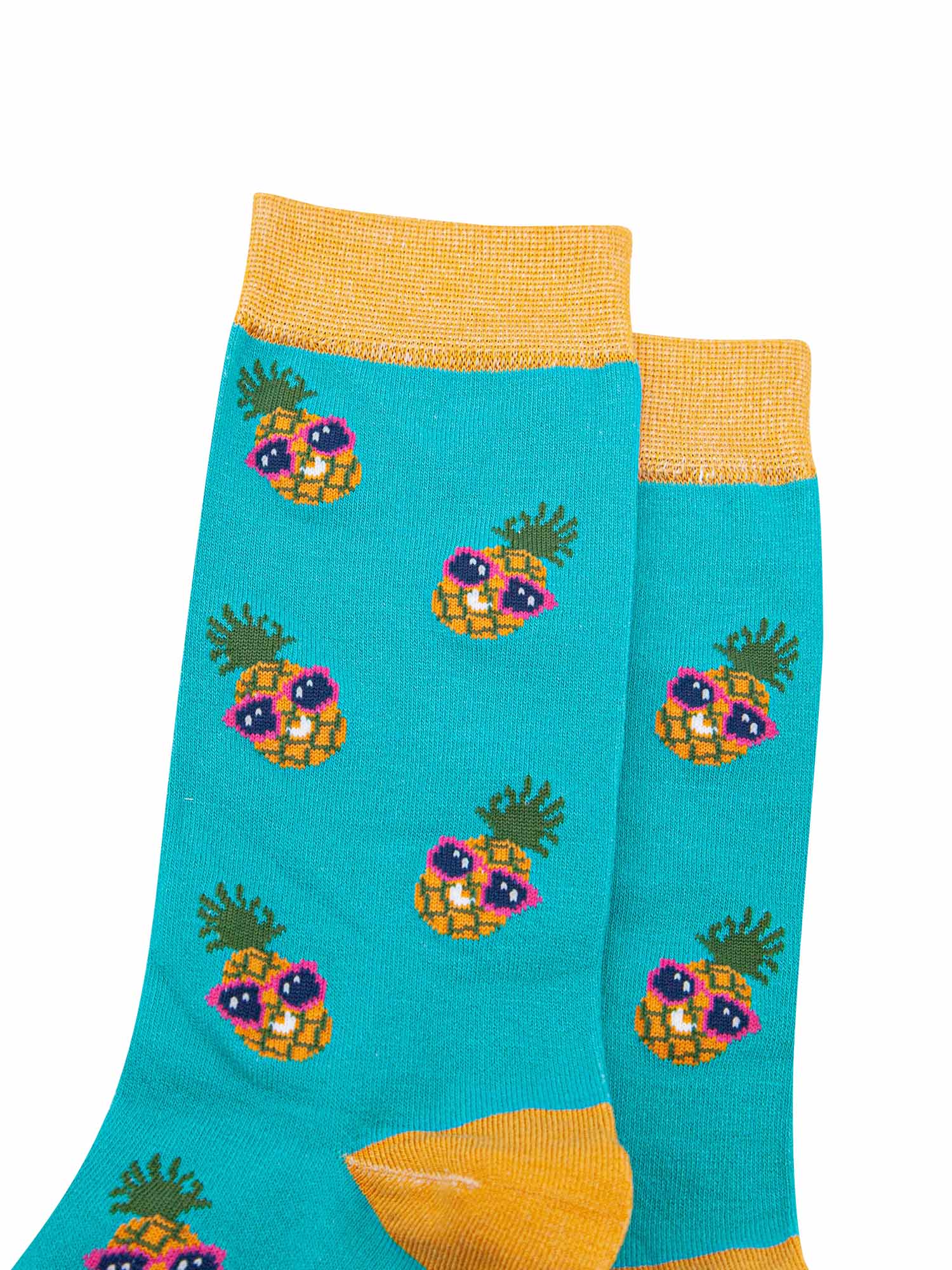 close up of the sunglass wearing pineapples on these mens bamboo socks

