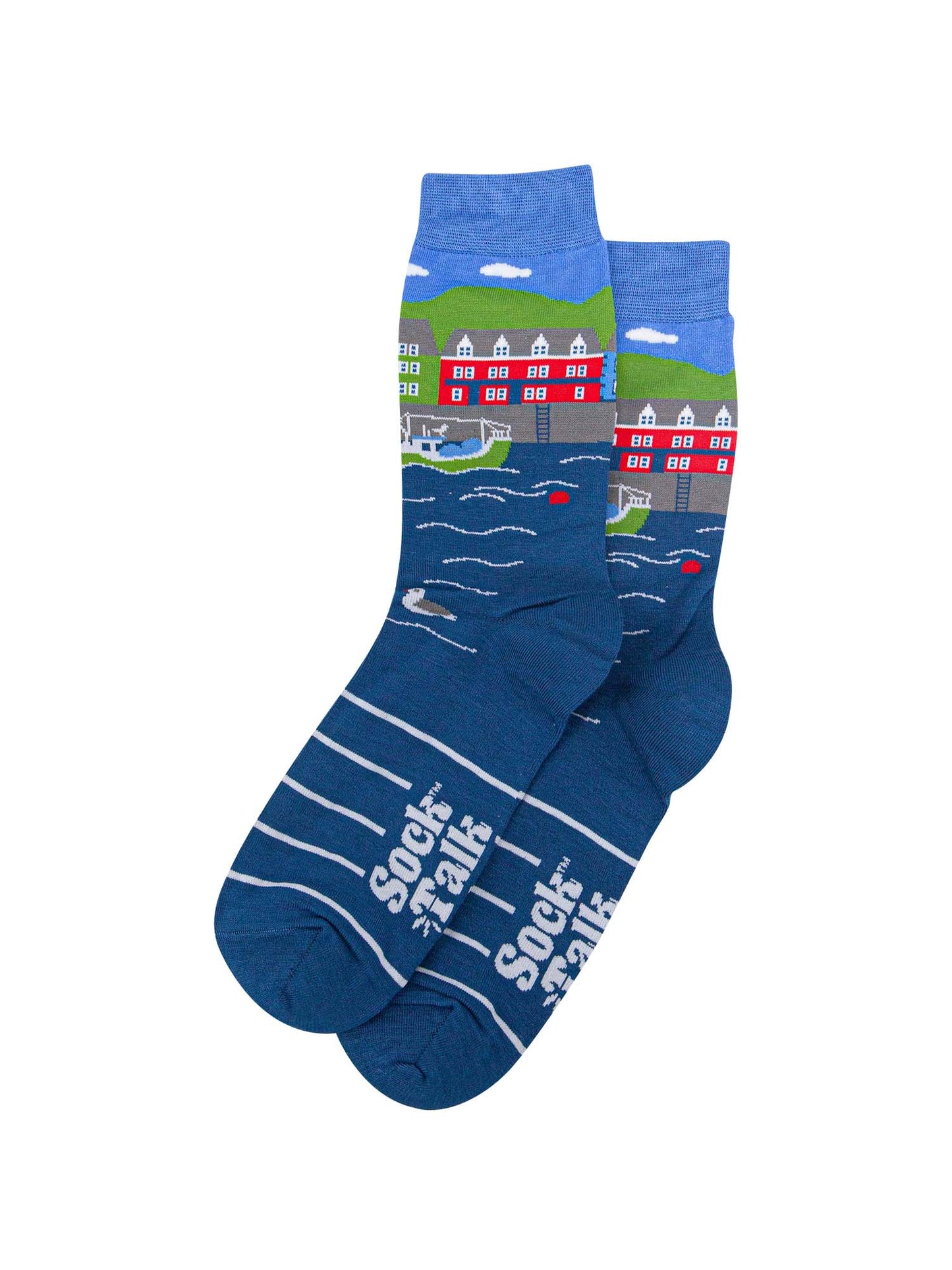 mens fishing village scene bamboo socks in blue, green and red, featuring a harbour setting with a fishing boat and seagulls