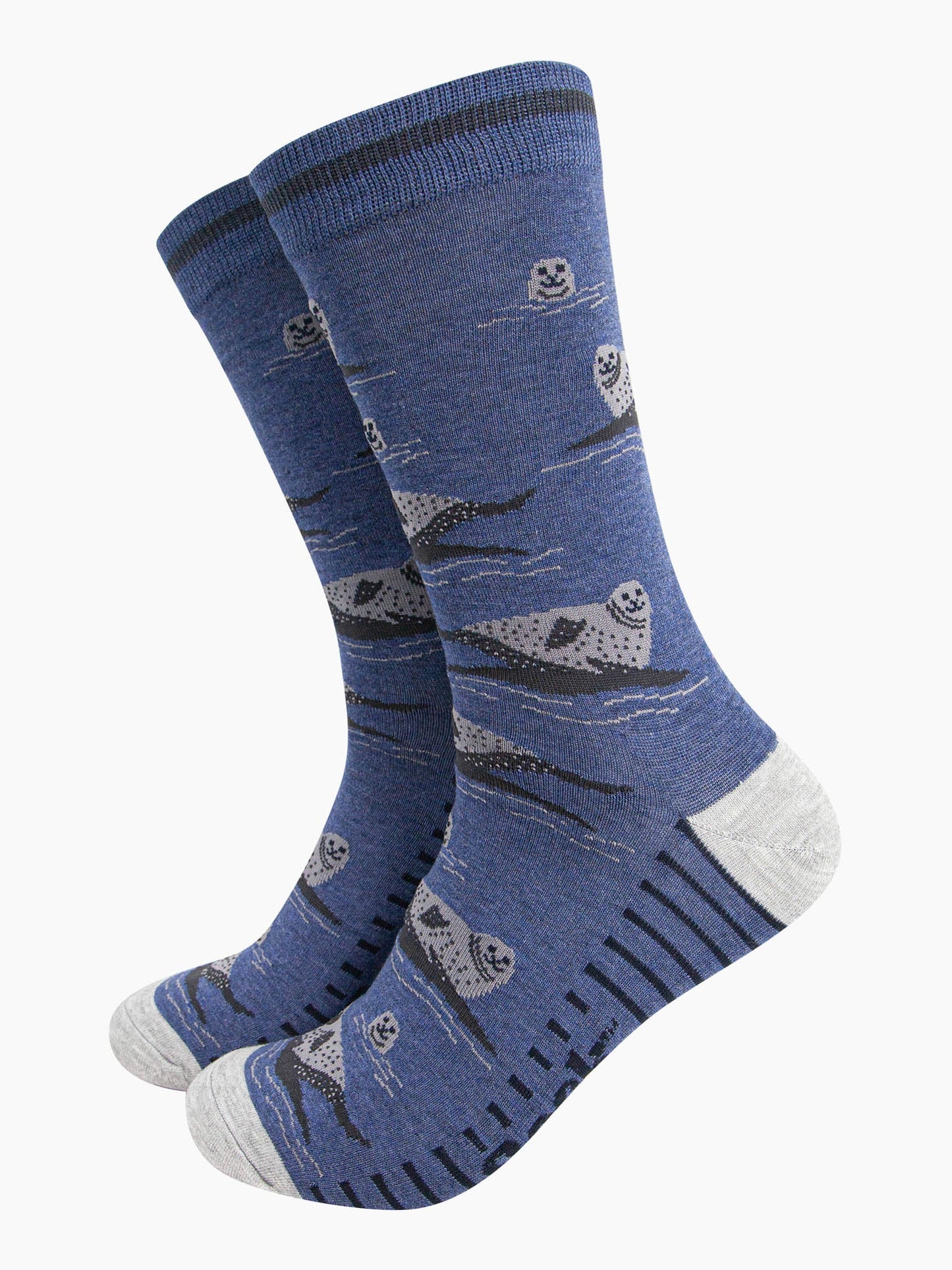 mens-bamboo-socks-denim-blue-seals-pattern-heads-above-water-relaxing-on-rocks