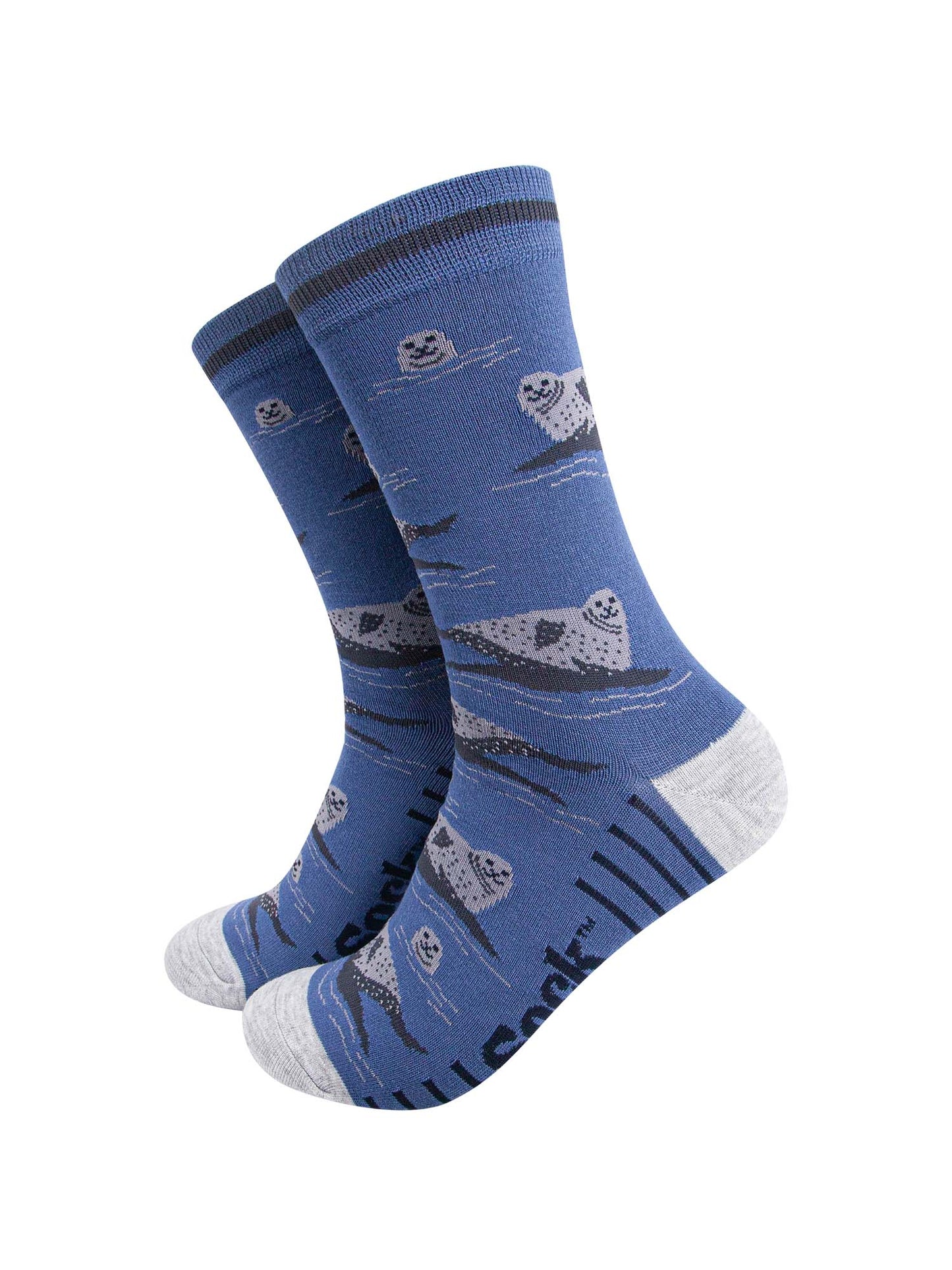 mens-bamboo-socks-denim-blue-seals-pattern-heads-above-water-relaxing-on-rocks