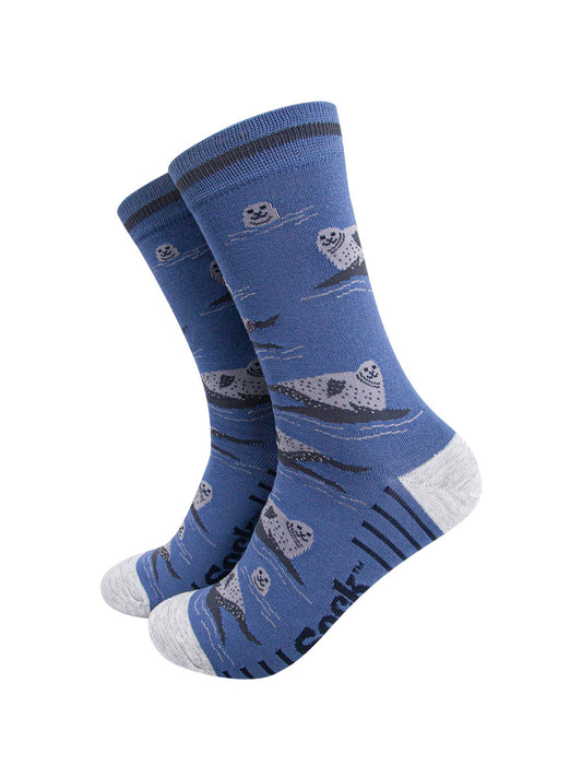 mens-bamboo-socks-denim-blue-seals-pattern-heads-above-water-relaxing-on-rocks
