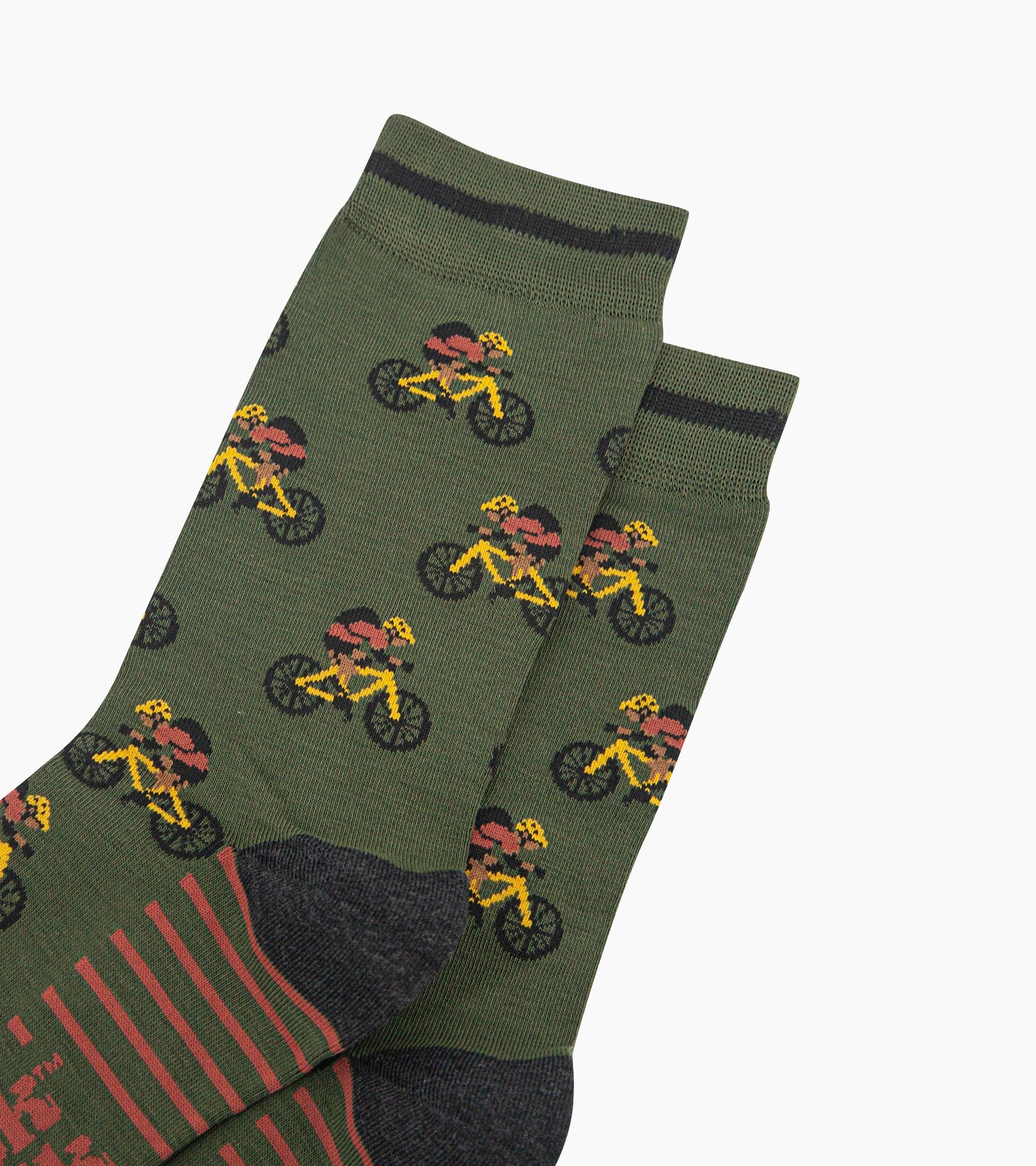 mens-bamboo-socks-khaki-mountain-bikers-close-up-cyclist-with-backpack-on-yellow-mountain-bikes