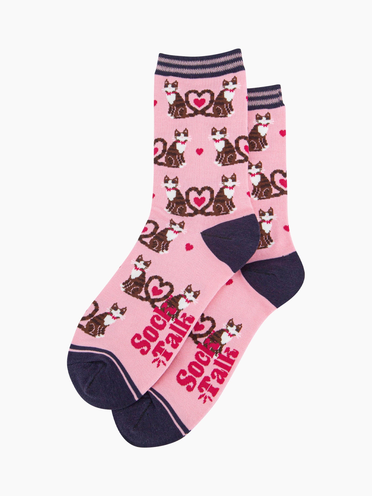 close up of the pattern. the cats are brown tabby striped and are wearing pink bow ties. Their tails are entwined in a love heart shaped loop. in the centre of the loop is a fuchsia pink love heart. there are smaller fuchsia pink love hearts scattered among the cats.