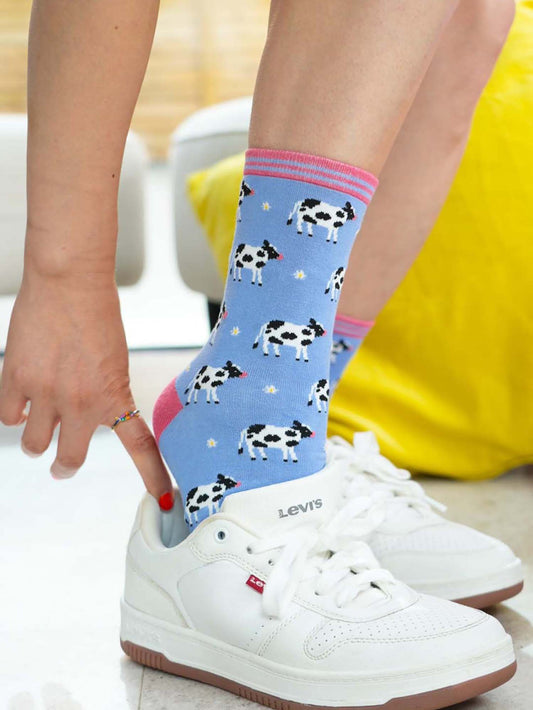 womens-spring-cow-print-bamboo-socks-styled-with-white-trainers