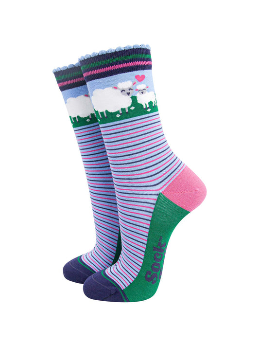 women's bamboo socks sheep and lamb. blue socks with pink and blue alternating horizontal pin stripes. the ankle features a mother sheep and baby lamb and a pink love heart.