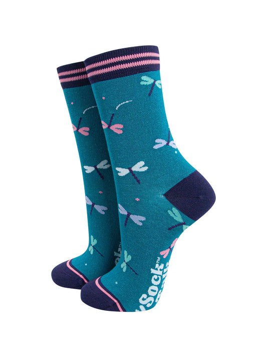 blue bamboo socks with a pattern of white, blue and pink dragonflies 