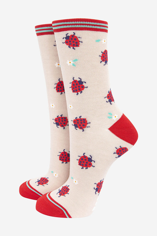 cream and red ankle socks featuring love heart shaped ladybirds and flowers