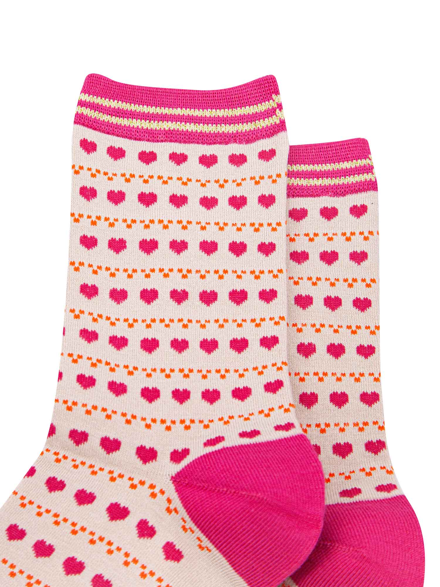 close up of the pink love heart patten on the bamboo ankle socks
