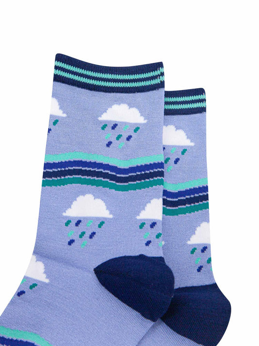 close up of the all over rain cloud and stripe pattern and striped cuff detail
