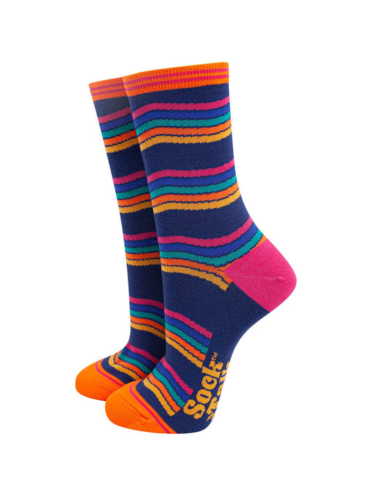 navy blue bamboo socks with a multicoloured wavy rainbow stripe pattern