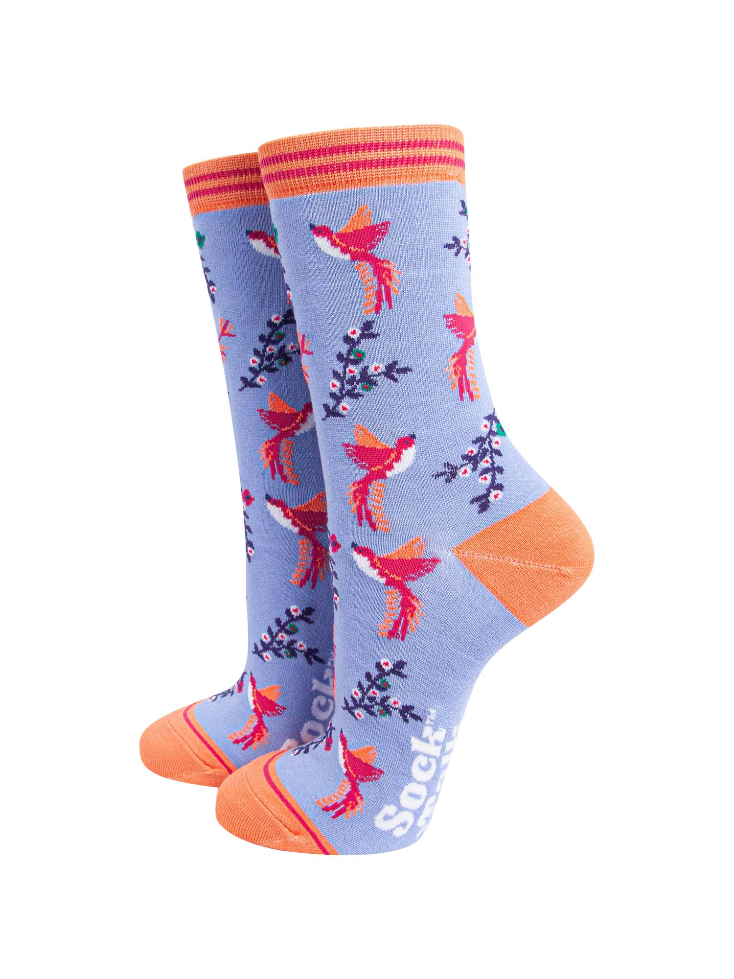 lilac blue ankle socks with orange toe and heel featuring a pattern of pink and orange hummingbirds and floral vines