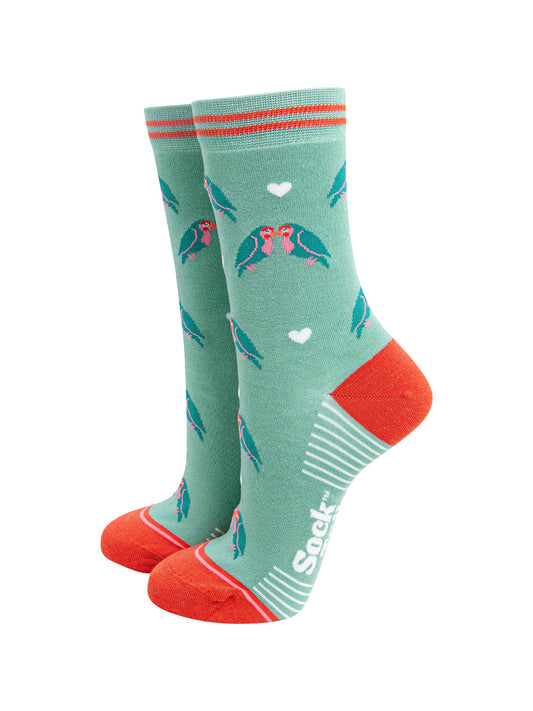 Standing-Flamingos-Bamboo-Socks-in-Green-On-Foot-Mannequin