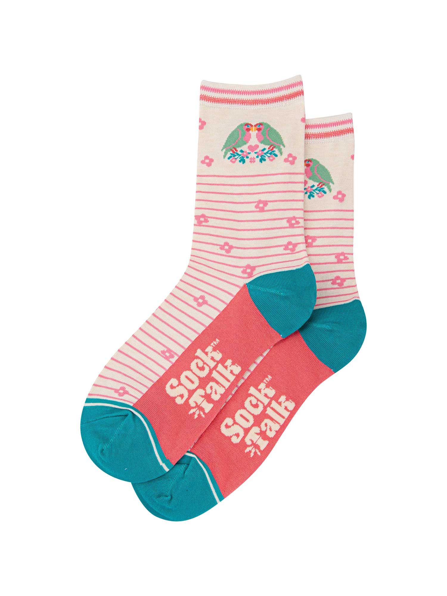 the pair of cream lovebird socks laying flat, one overlapping the other. showing clearly the cream background of the socks which is contrasted by light pink horizontal pinstripes. on the ankle there are two love birds facing each other, there is a pink love heart in the middle of them. the sock talk logo is cream visible on the base of the sole. 