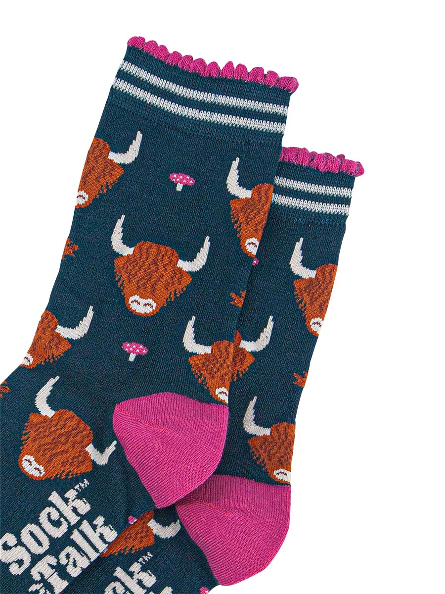 womens-bamboo-socks-forest-green-cream-highland-cow-leaves-close-up