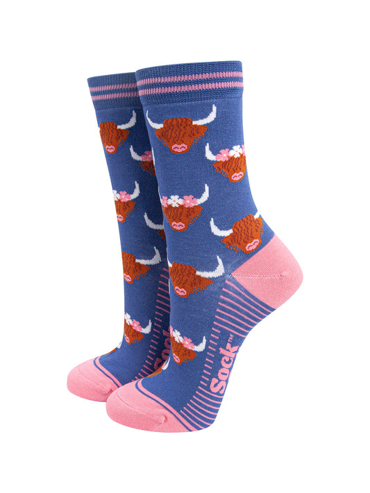 Floral-Crown-Highland-Cow-Bamboo-Socks-in-Blue-mannequin