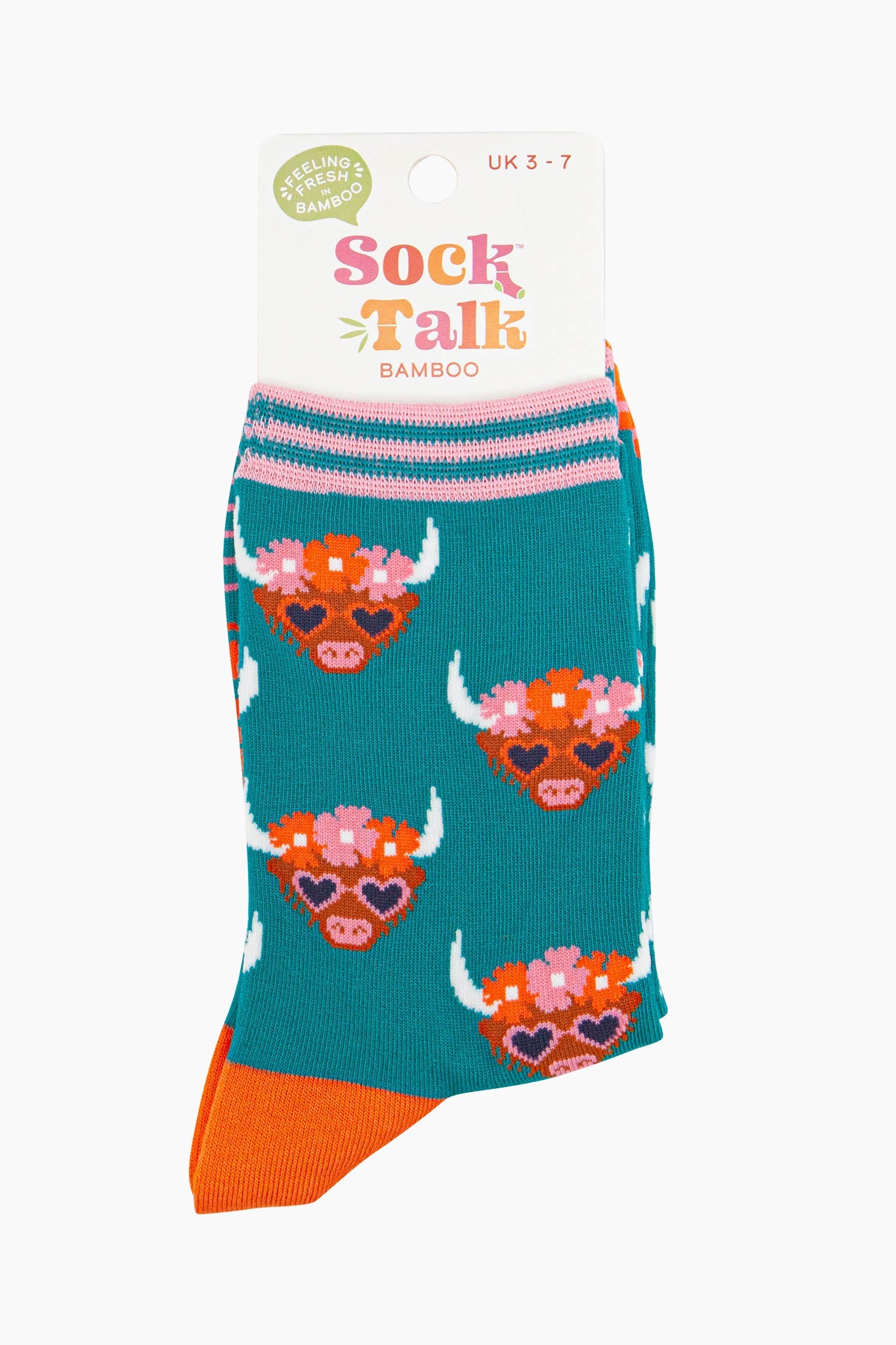 women's teal highland cow and floral crown ankle socks in their sock talk packaging, the socks are a uk size 3-7.