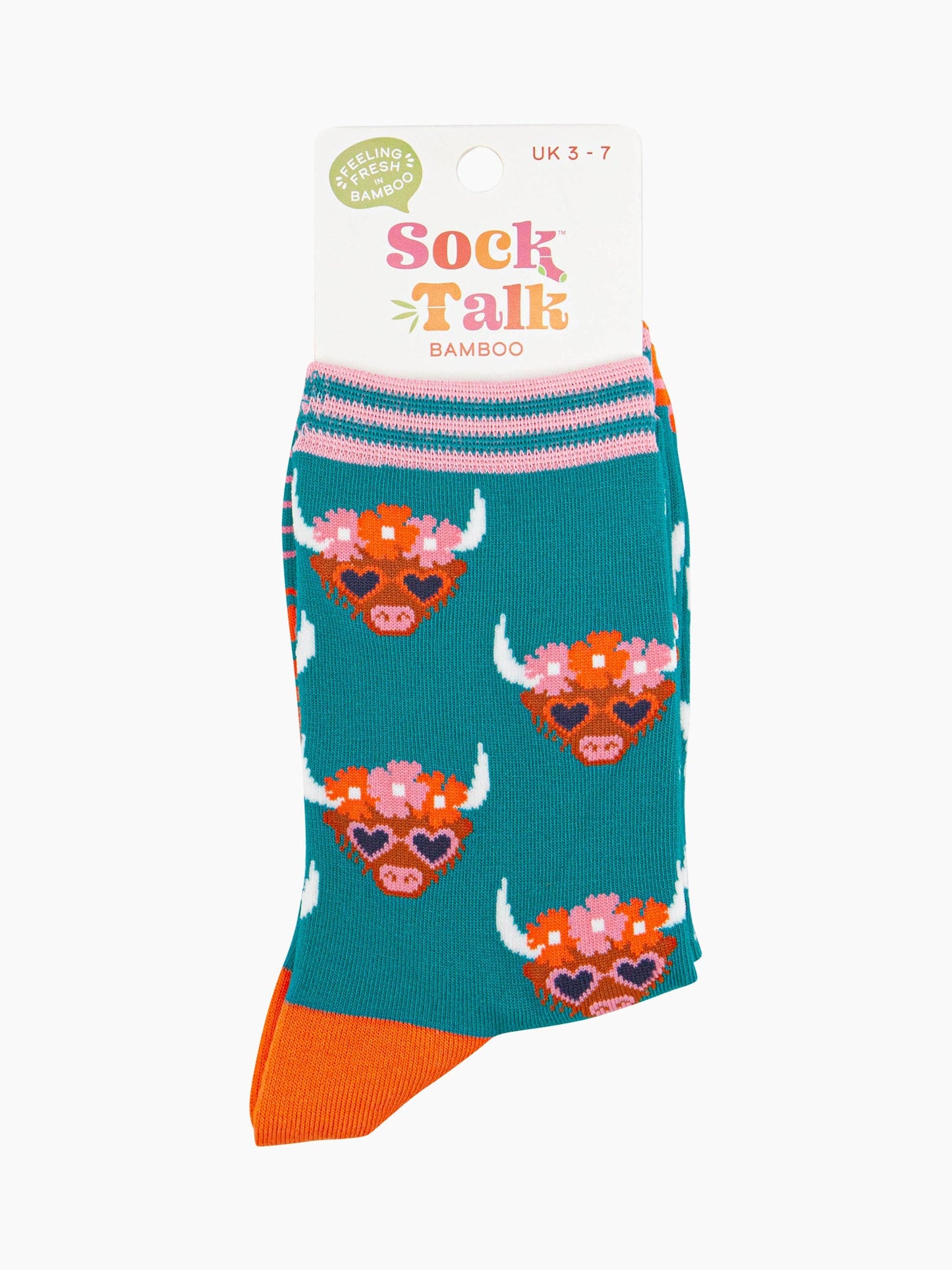 women's teal highland cow and floral crown ankle socks in their sock talk packaging, the socks are a uk size 3-7.