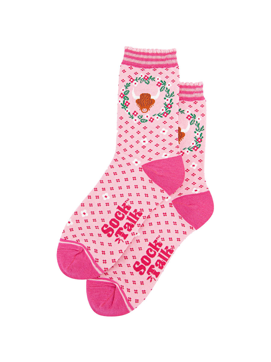 womens-bamboo-socks-pink-highland-cow-wreath-laying-flat-floral-pattern