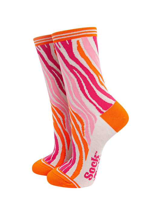 bamboo ankle socks with an all over zebra print pattern in orange and pink