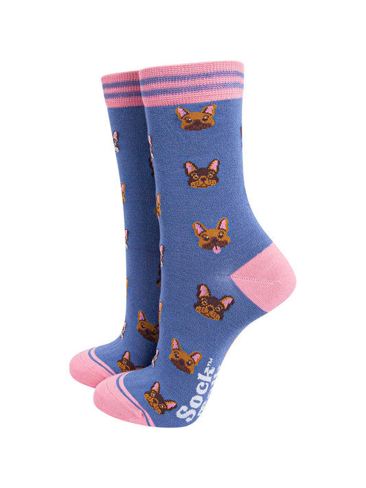 blue and pink bamboo socks with an all over pattern of french bulldog faces in black and brown
