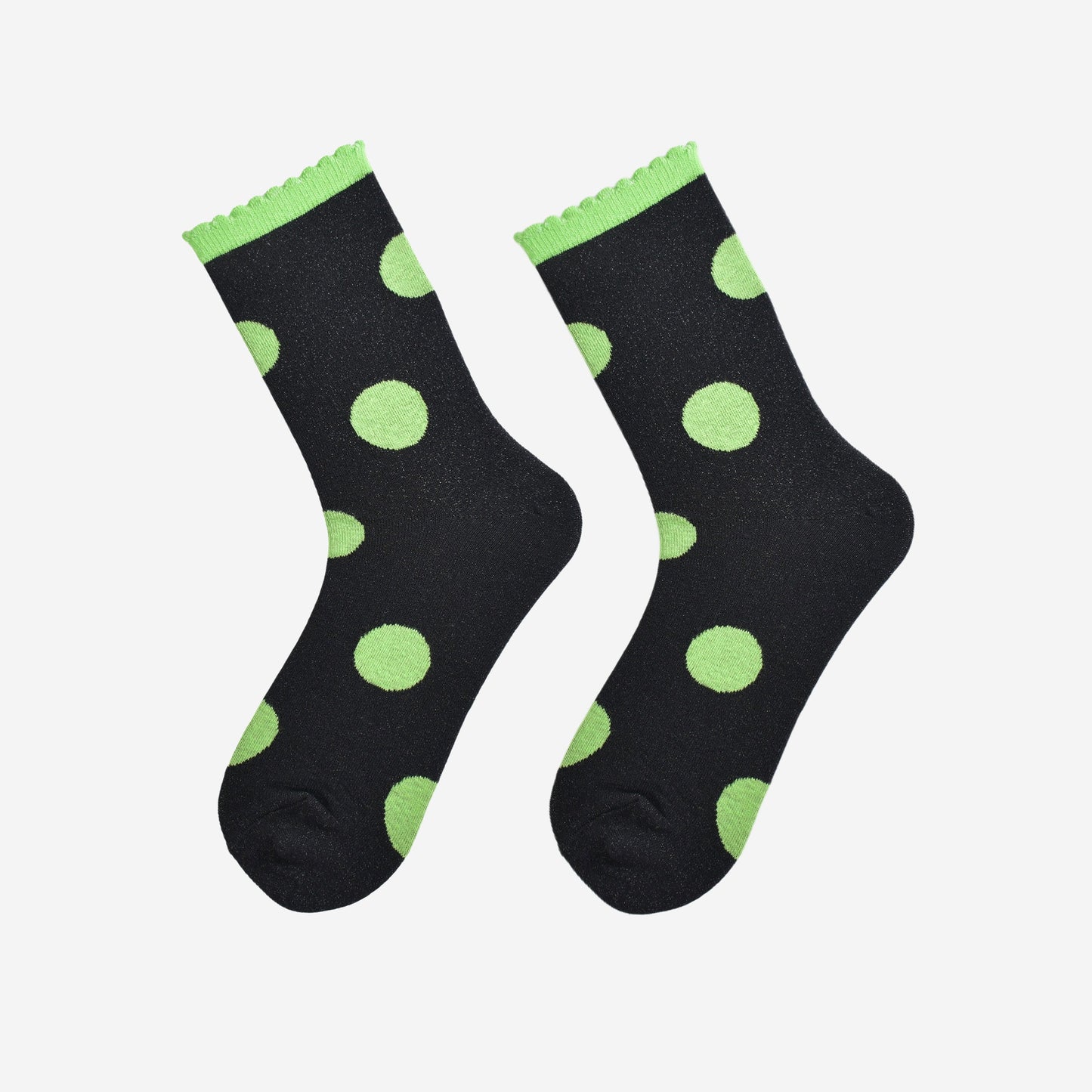 black and lime green large polka dot pattern glitter socks laying flat, showing the all over glitter sparkle