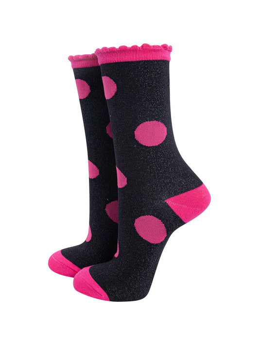 black and pink glitter ankle socks with an all over large polka dot spot pattern and sparkly shimmer, the socks have scalloped edge cuffs