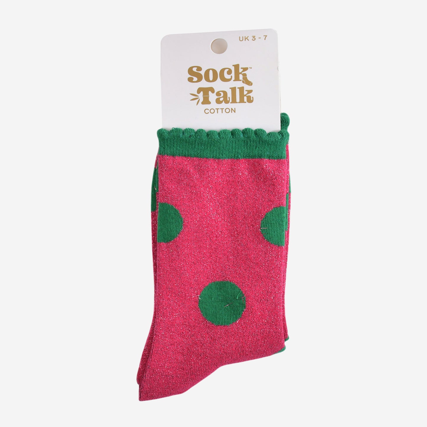 hot pink and green polka dot glitter socks in their sock talk packaging, these socks are a uk size 3-7