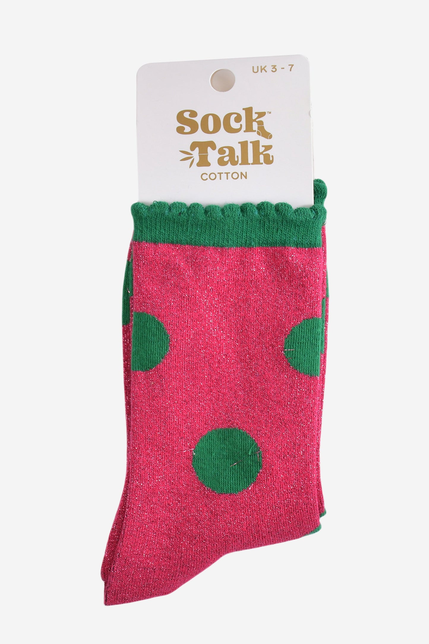 hot pink and green polka dot glitter socks in their sock talk packaging, these socks are a uk size 3-7