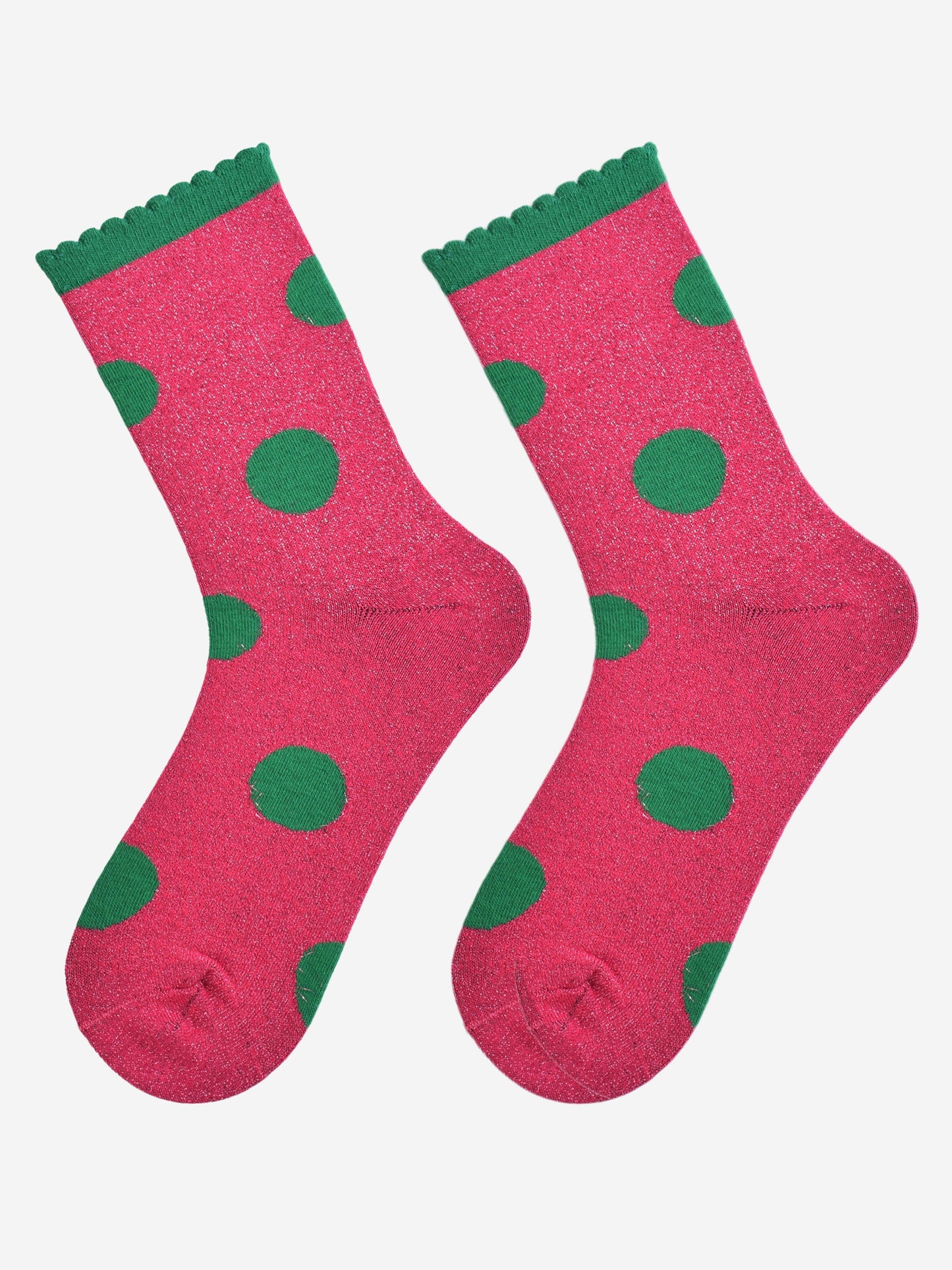  hot pink and green large polka dot pattern glitter socks laying flat, showing the all over glitter sparkle