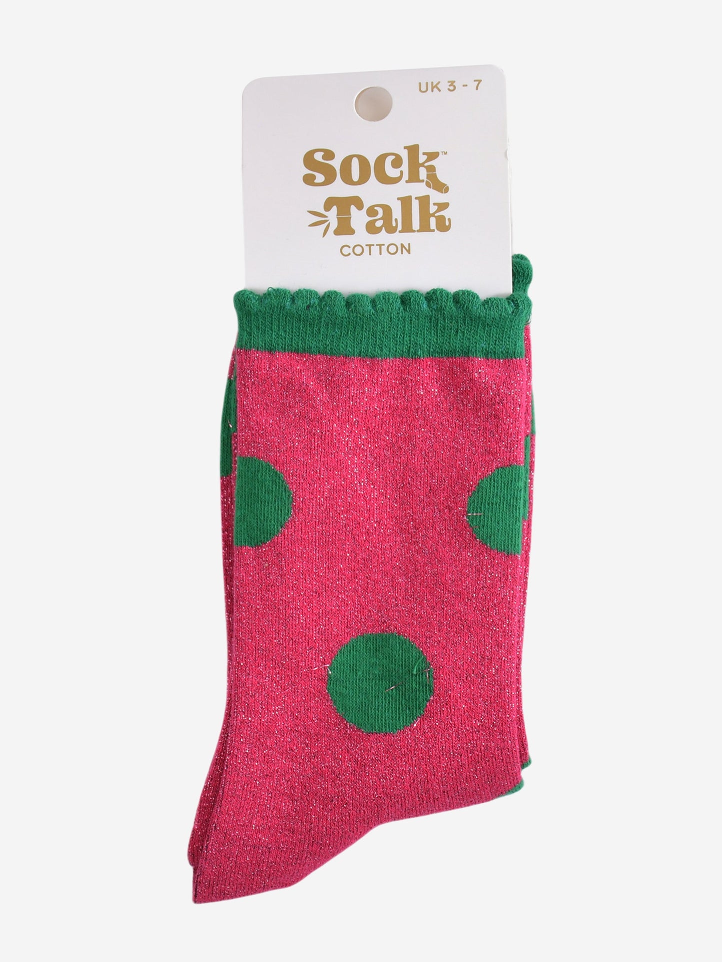 hot pink and green polka dot glitter socks in their sock talk packaging, these socks are a uk size 3-7