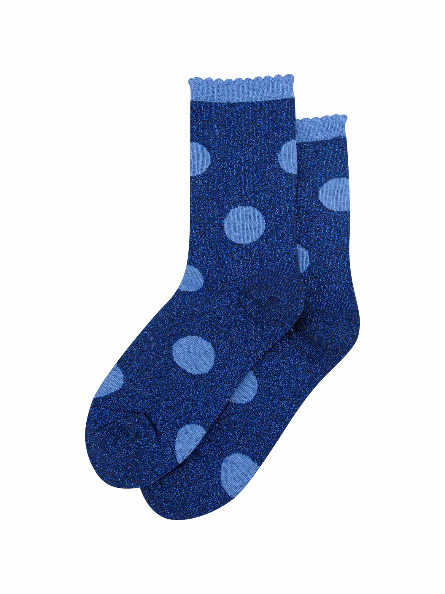 navy blue socks with a large light blue polka dot pattern and scalloped cuff